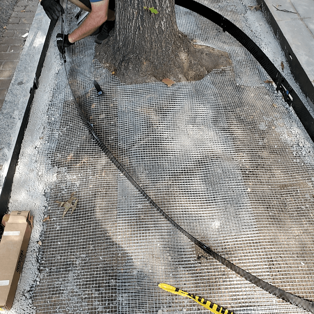 Bare street tree box with soil during installation